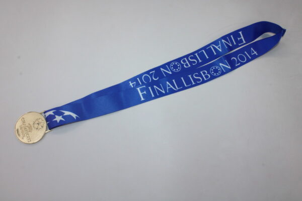 Medalla Final Champions League 13/14